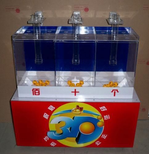 彩票摇奖机是谁发明的,彩票摇奖机，谁为幸运之轮转动钥匙？